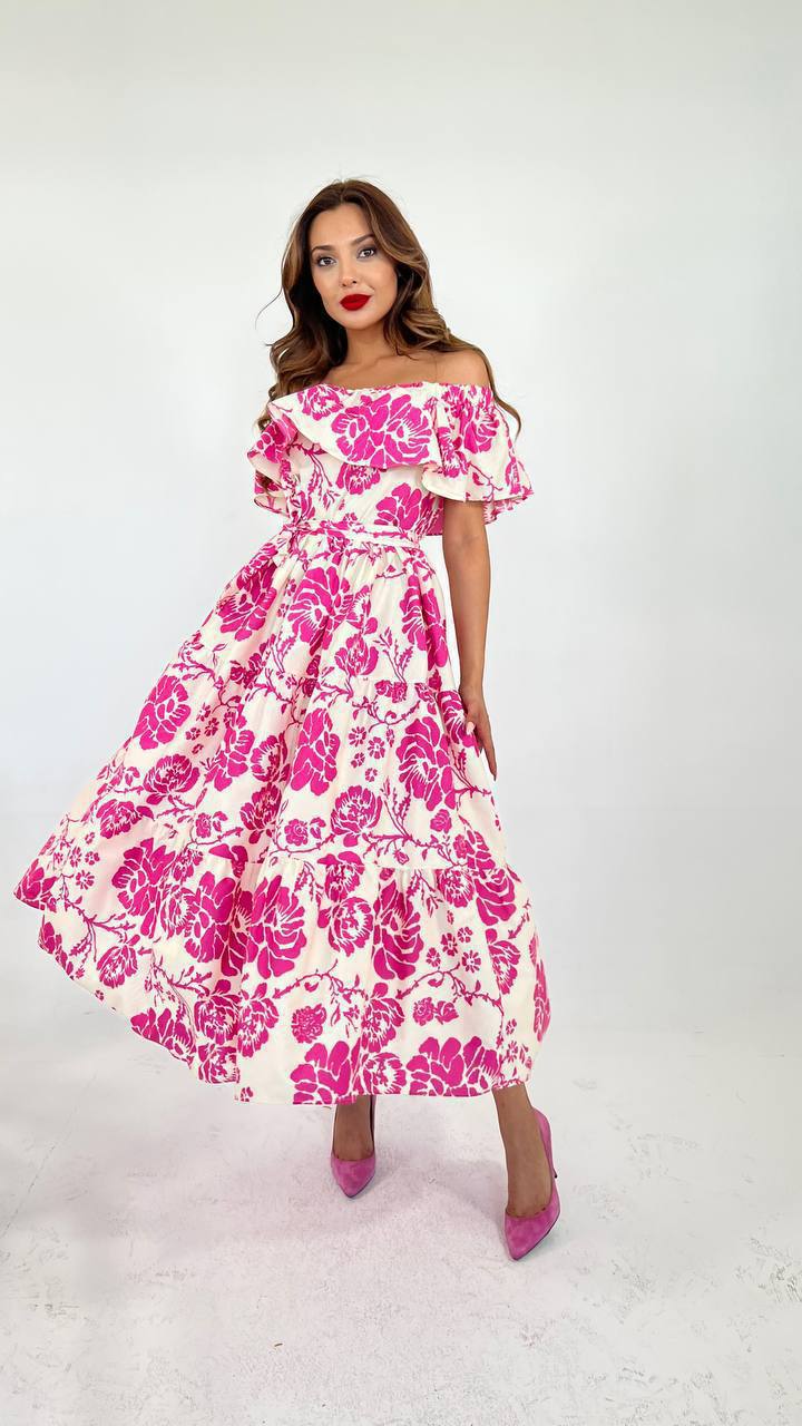 Model wearing pink off the shoulder ruffle hem floral print dress