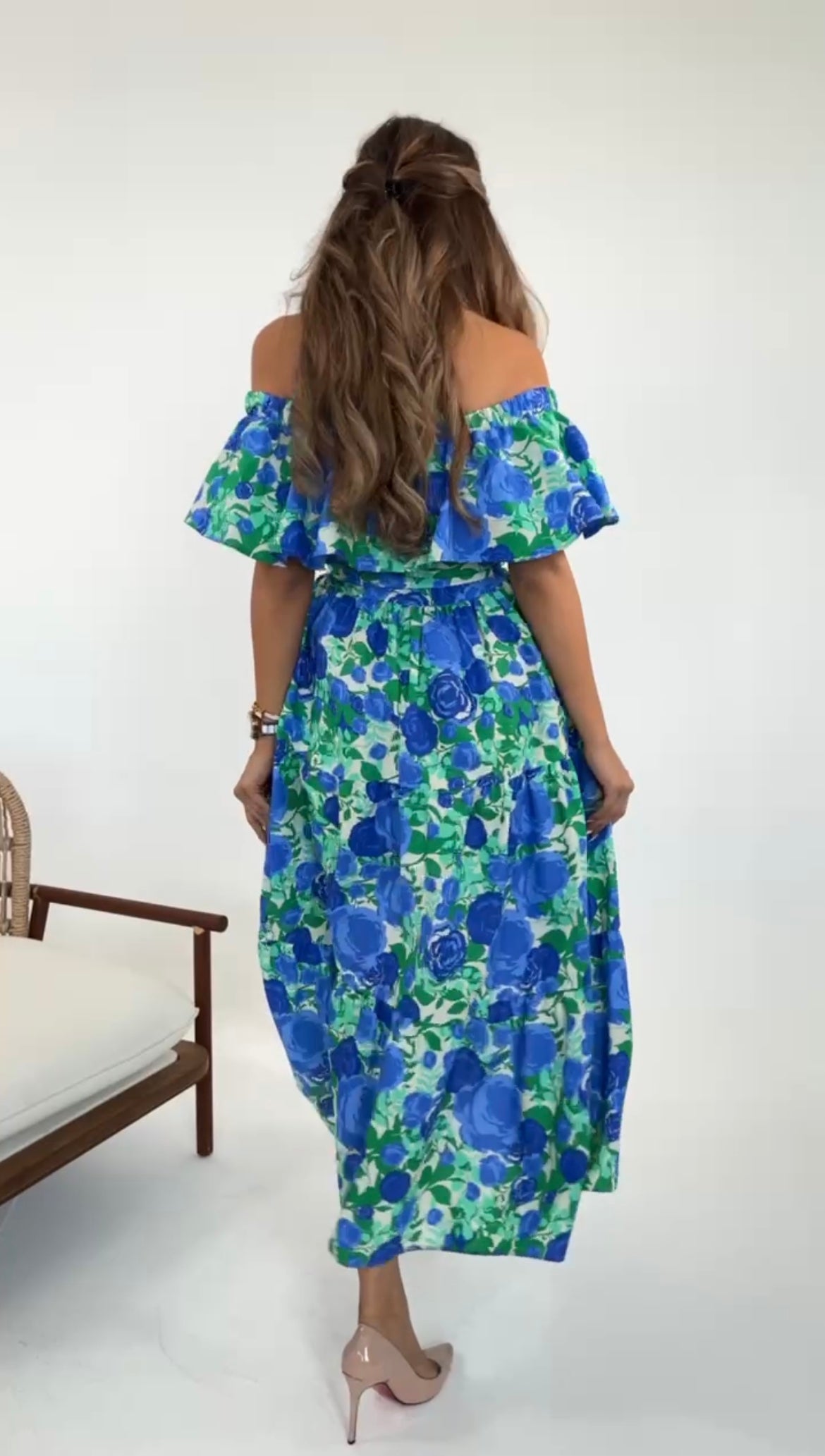 Back view of off the shoulder ruffle hem floral print dress