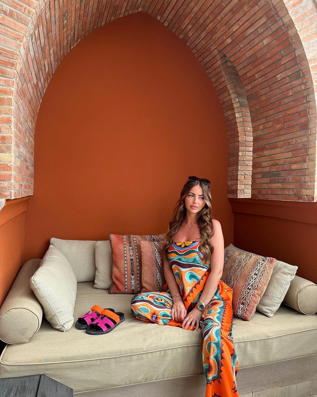 Model sitting wearing Women's Multi-Print Two Piece Set