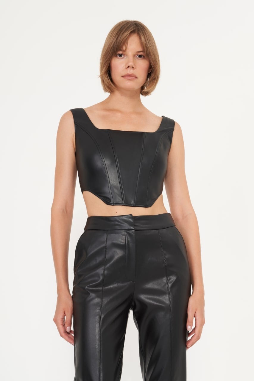 Front View Of Model Wearing Leather Crop Top